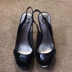 7.5 black patent leather G by Guess high heals.